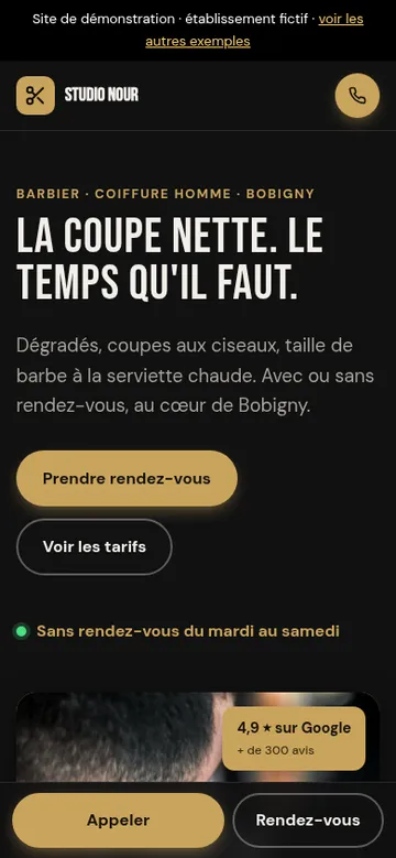 Site d'un barbier affiché sur téléphone
